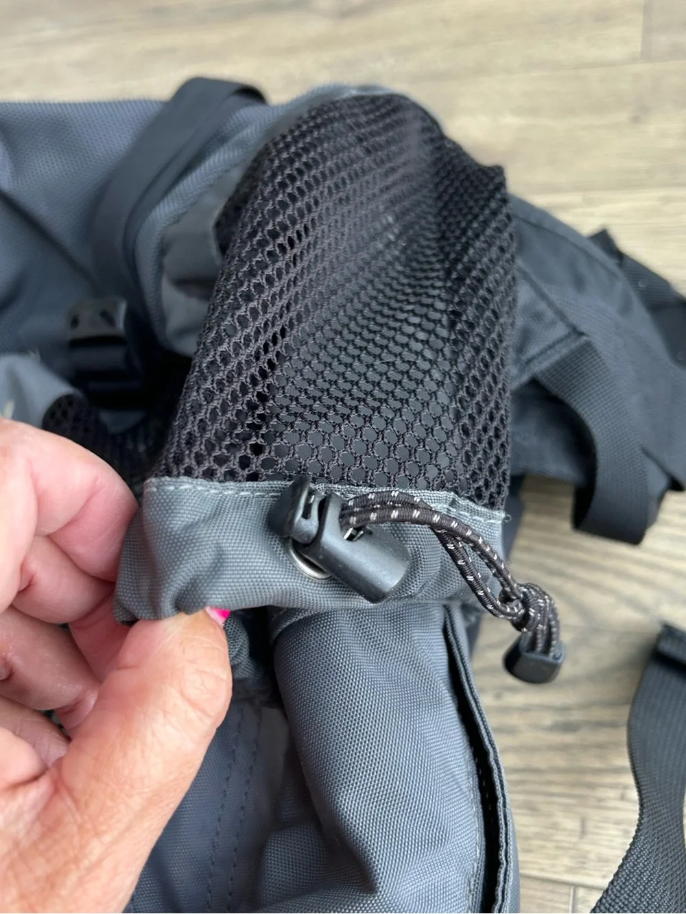 The North Face Gray and Black Backpack with Mesh Pockets